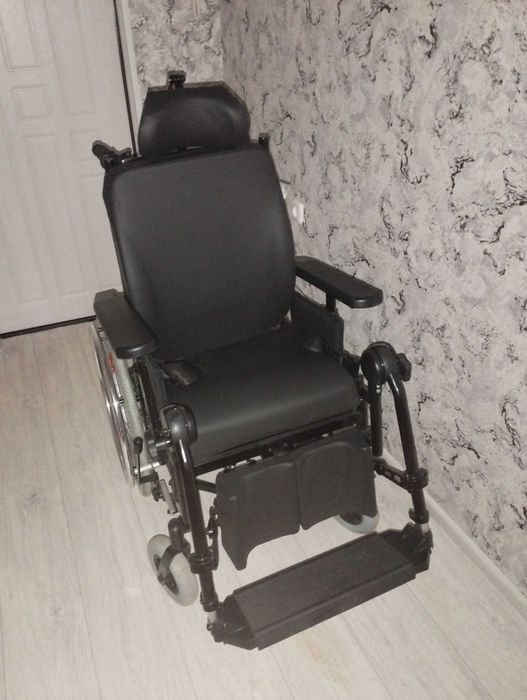 Многофункциональное кресло-коляска