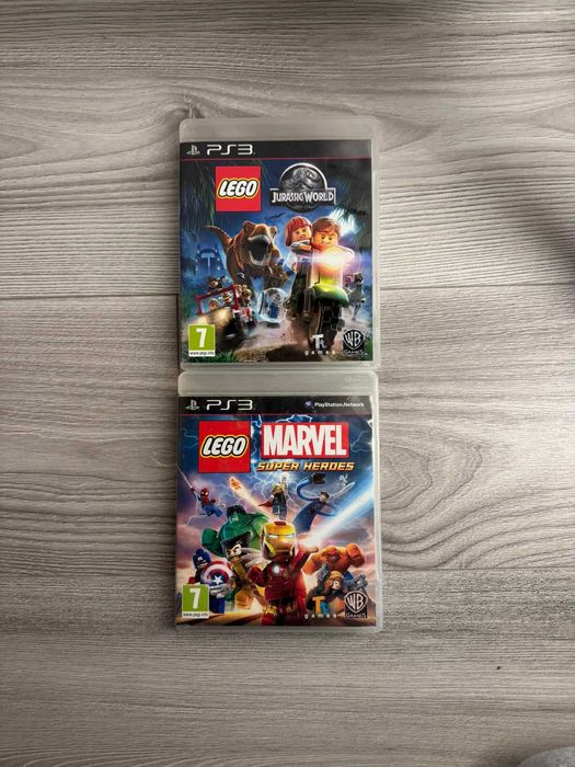 Lot 2 jocuri LEGO PS3 – Jurassic World + Marvel Super Heroes, cu manuale