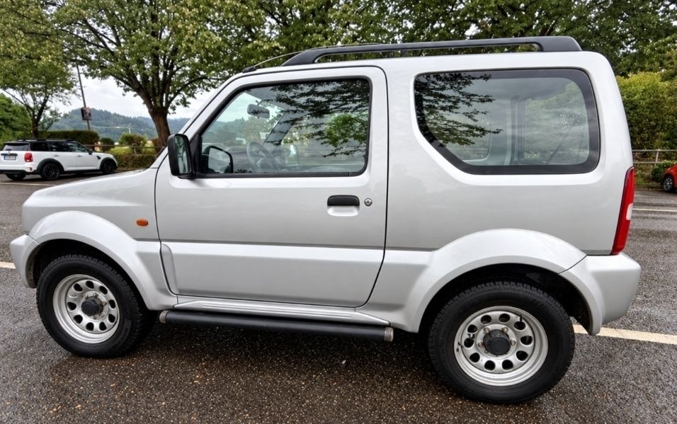 Suzuki JIMNY .1.3  benzina , REDUCTOR, AER CONDITIONAT rate, garantie, livrare la domiciliul clientului