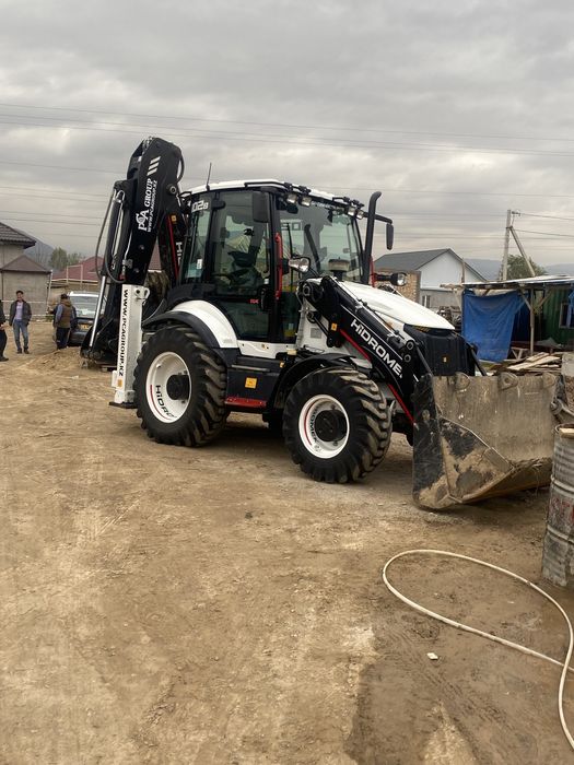 Услуги трактора погрузчика экскаватора