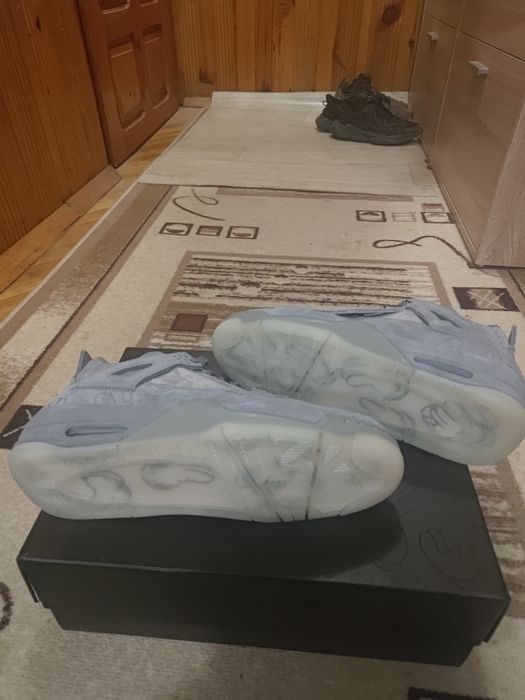 KAWS x Air Jordan 4 Retro Cool Grey