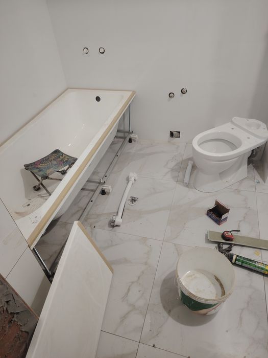 Плиточник, кафельшик.