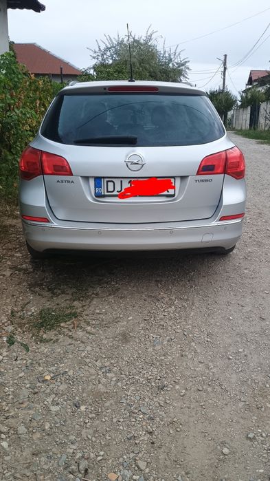 OPEL Astra 2013 — imagine 7