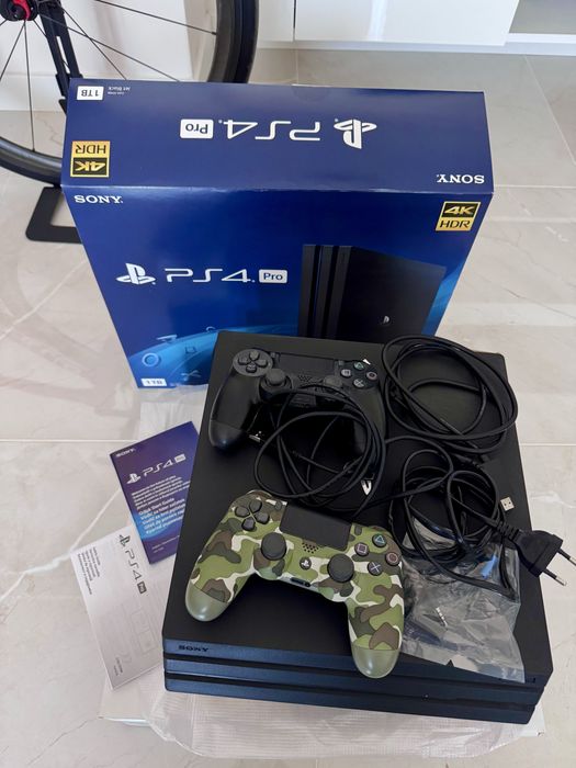 Playstation 4 Pro 1 TB SSD - пълен комплект + 9 игри