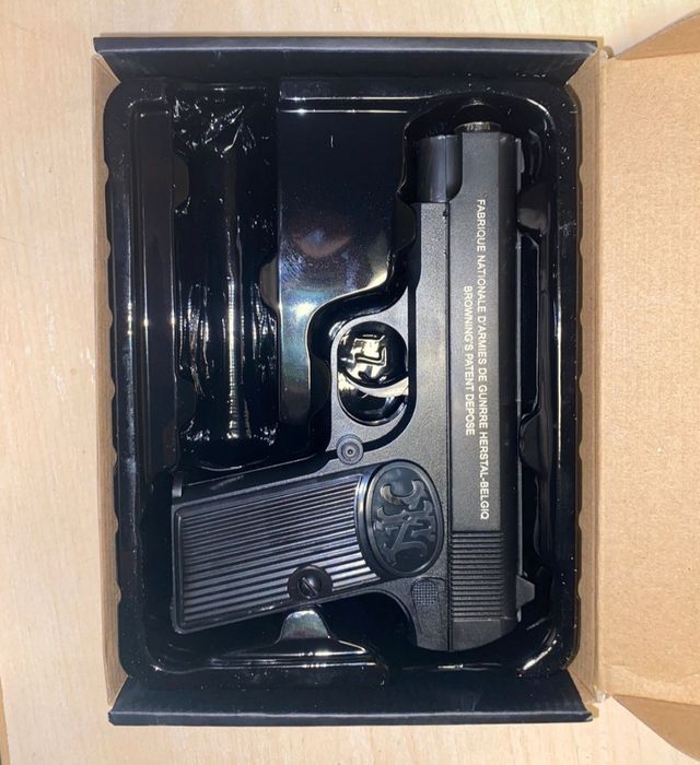 Игрушечный пистолет