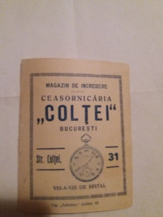 Bijuterii perioada interbelica,poanson "cap lupoaica"aur 14k cu diaman