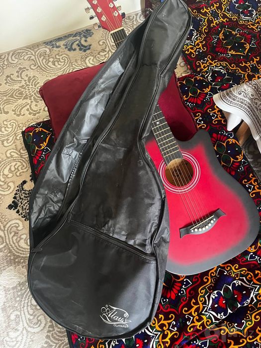 Gitara Astanadan olganman
