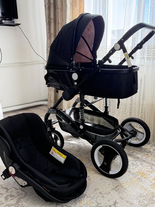 Продам коляску черную 3 в 1
