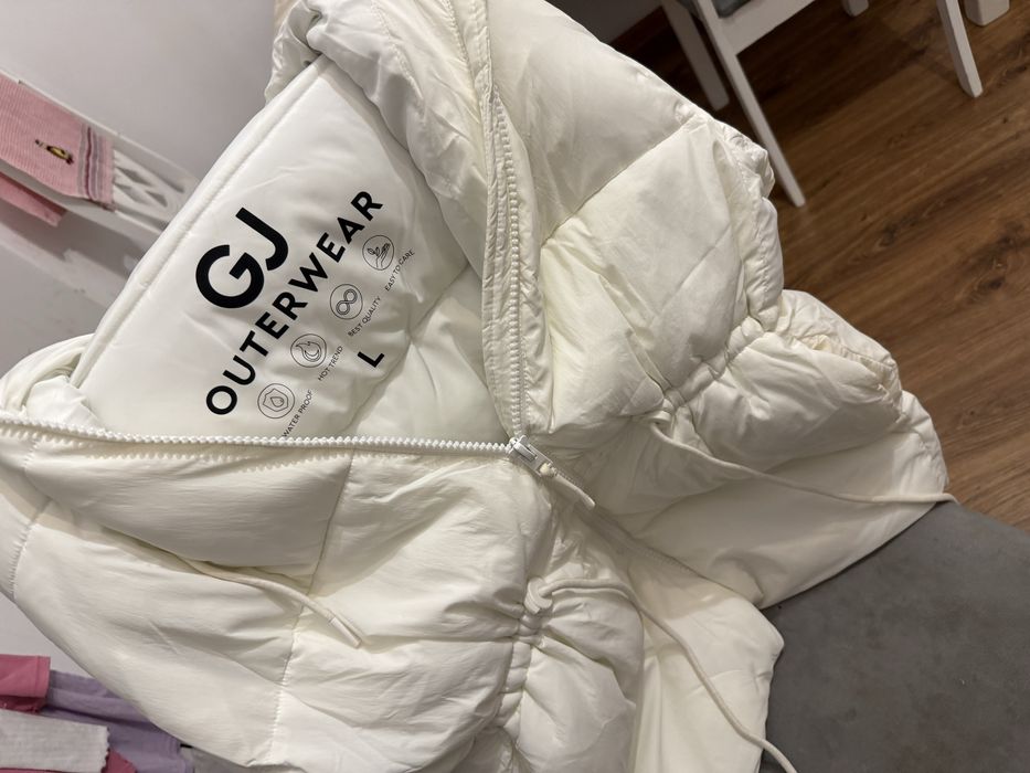 Белый пуховик новый