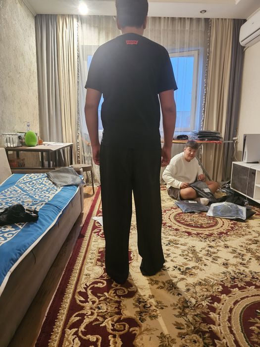 Новые широкие черные брюки
