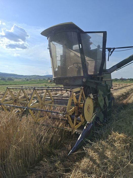 Combina  john deere 935