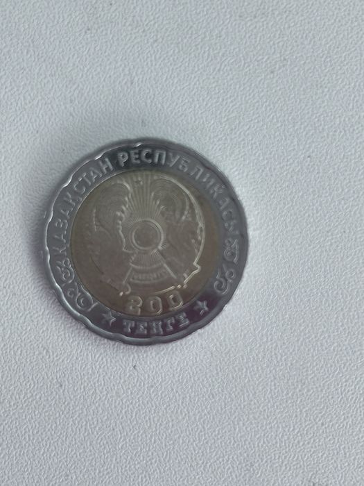 Продам манету 200тг