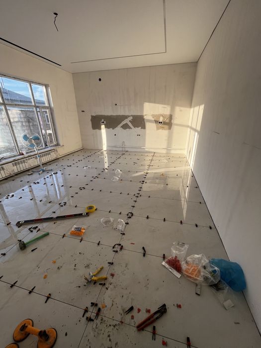 Опытный кафельщик