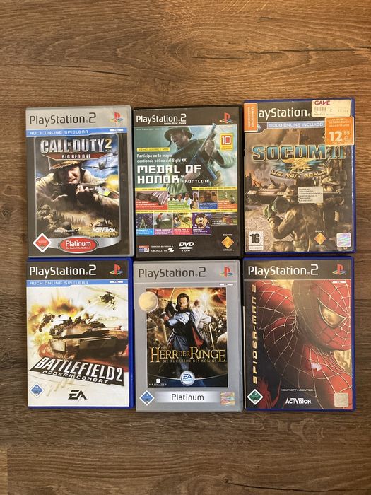 Playstation 2 + volan+ jocuri