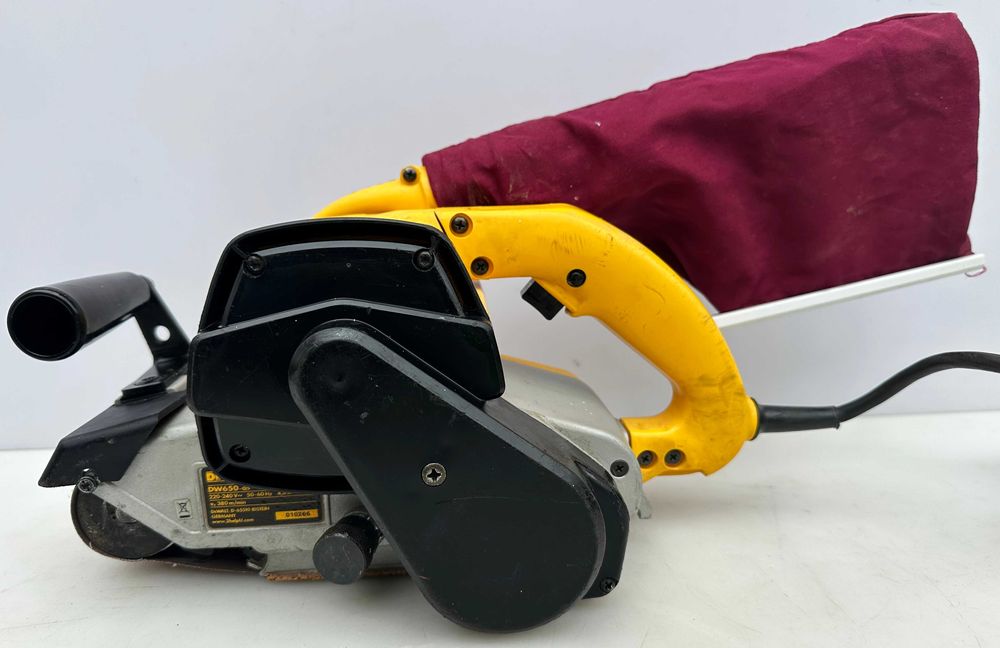 DeWALT DW650-QS - Професионален лентов шлайф 1010W