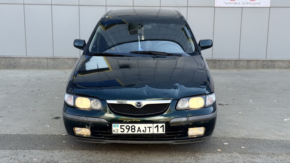 Мазда 626 птичка