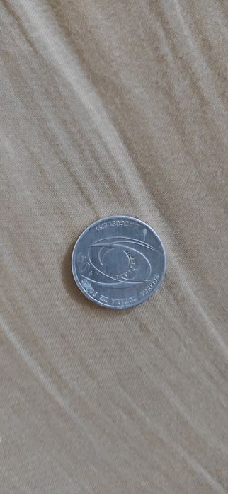 Monedă 1999 cu eclipsa de soare