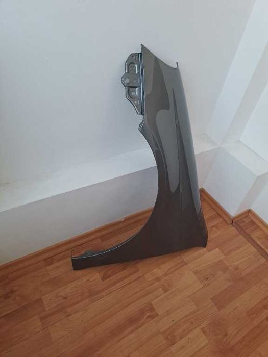 Aripa stanga noua VW Golf 5 Break culoare LA7T