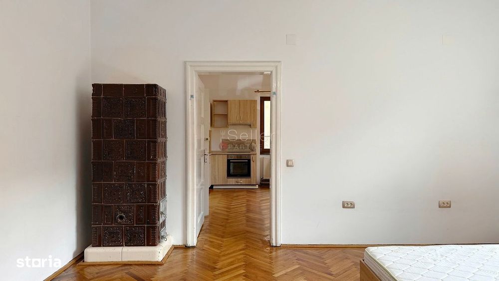 Apartament cu Acces la Curte Garaj Inclus