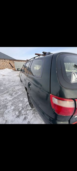 Тайота  Карина е