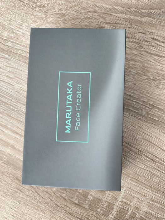 Портативный массажер для лица