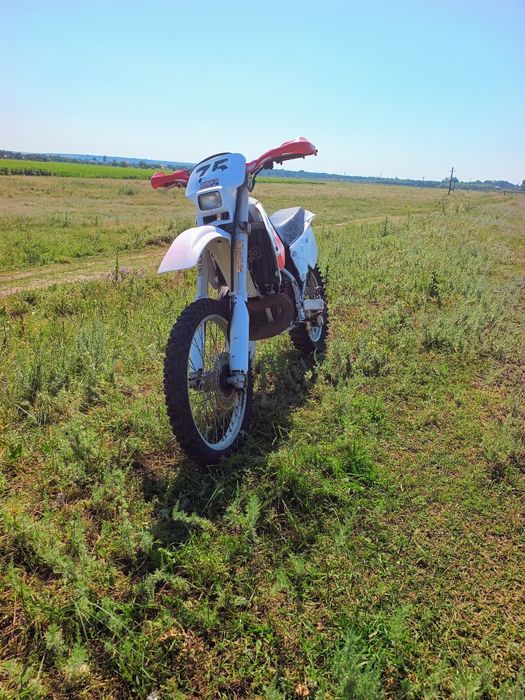 Vând sau schimb cross  Honda 250 2t