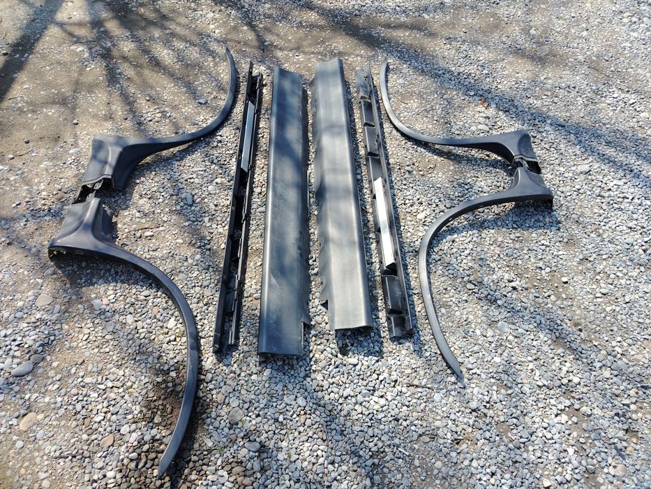 Пороги и накладки е53 дорест.