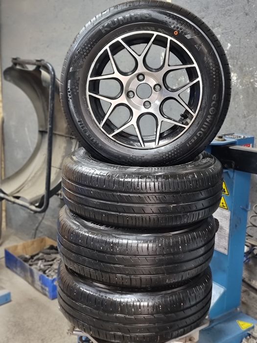 Продам комплект летних шин с дисками 195/65/15