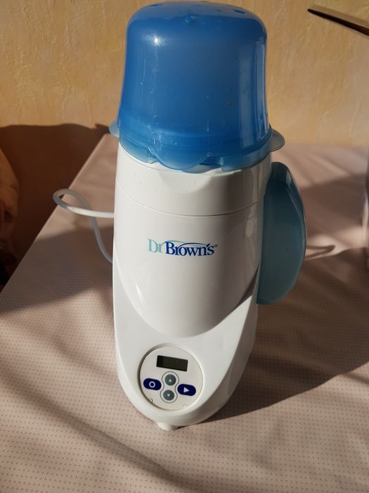 Уред за затопляне на бебешки бутилки