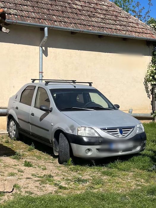 vând dacia logan