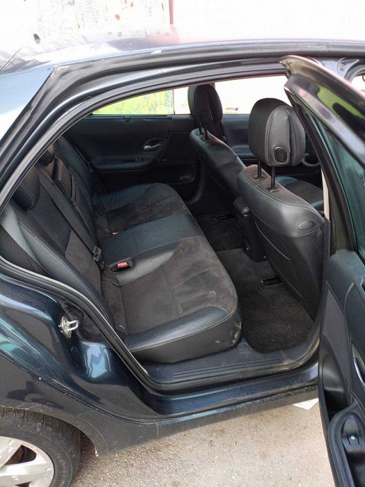 Рено Лагуна на части