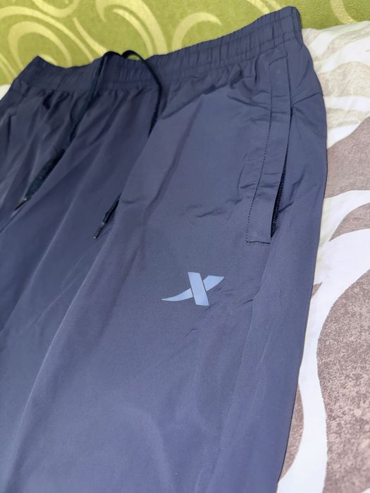 Спортивные оригинальные штаны Xtep