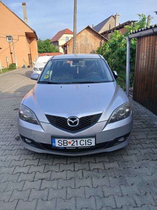 Vând  Mazda 3  anul 2008