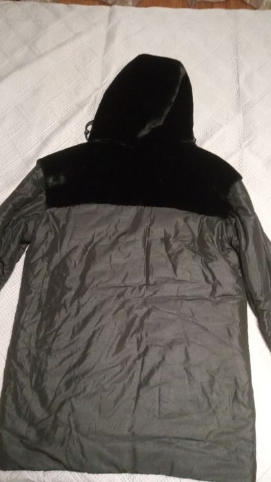 Новый пуховик 50 р