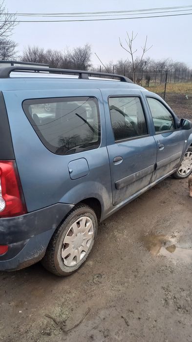 Vând  (sau schimb) LOGAN MCV 2009