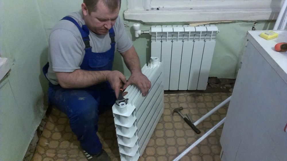 Отопления установка батарей кател