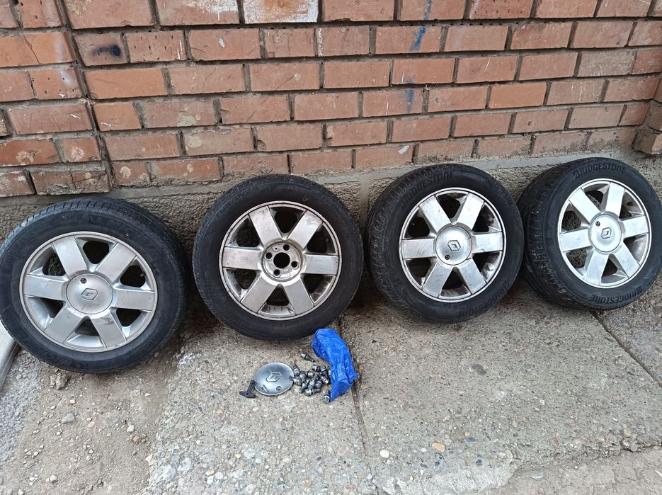 Jante originale R16 aliaj Aluminiu Renault Laguna 1  cu cauciucuri de vara 205/55/R16 și prezoane + roata rezerva