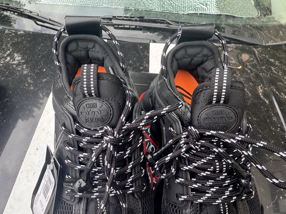 Versace chain reaction