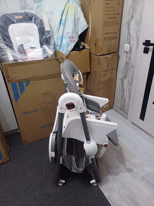 Продаётся фирменный кормления стульчик karma baby