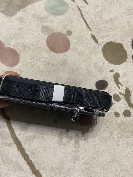 Барсетки новые Lacoste