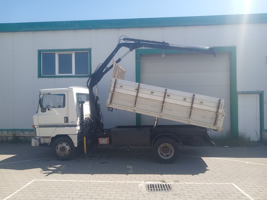 Nissan L 70-09,cu macara și basculare