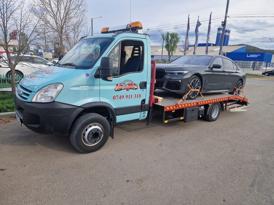 Platforma Iveco cu macara și troliu