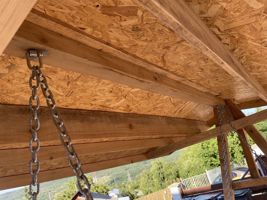 Foișor din lemn 4×2,5 m cu pat‑leagăn transformabil în masă 2×1 m