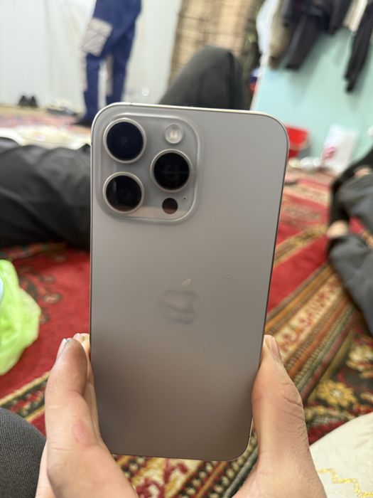 Iphone 15 pro max  holati ideal karopka bor hamma joyi uziniki