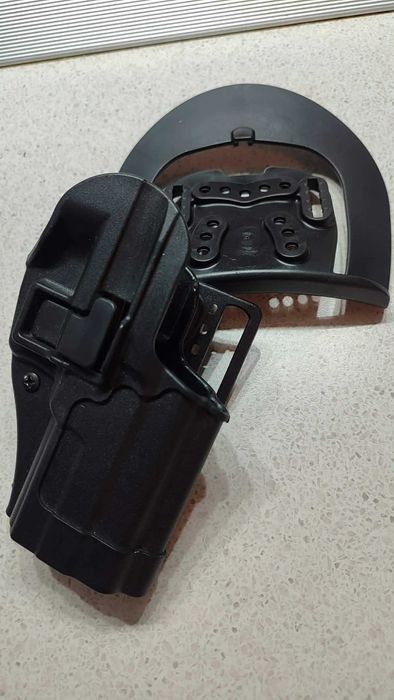 Тактическият кобур Blackhawk Sig Sauer  и Кобур пълнител 9mm BlackHawk