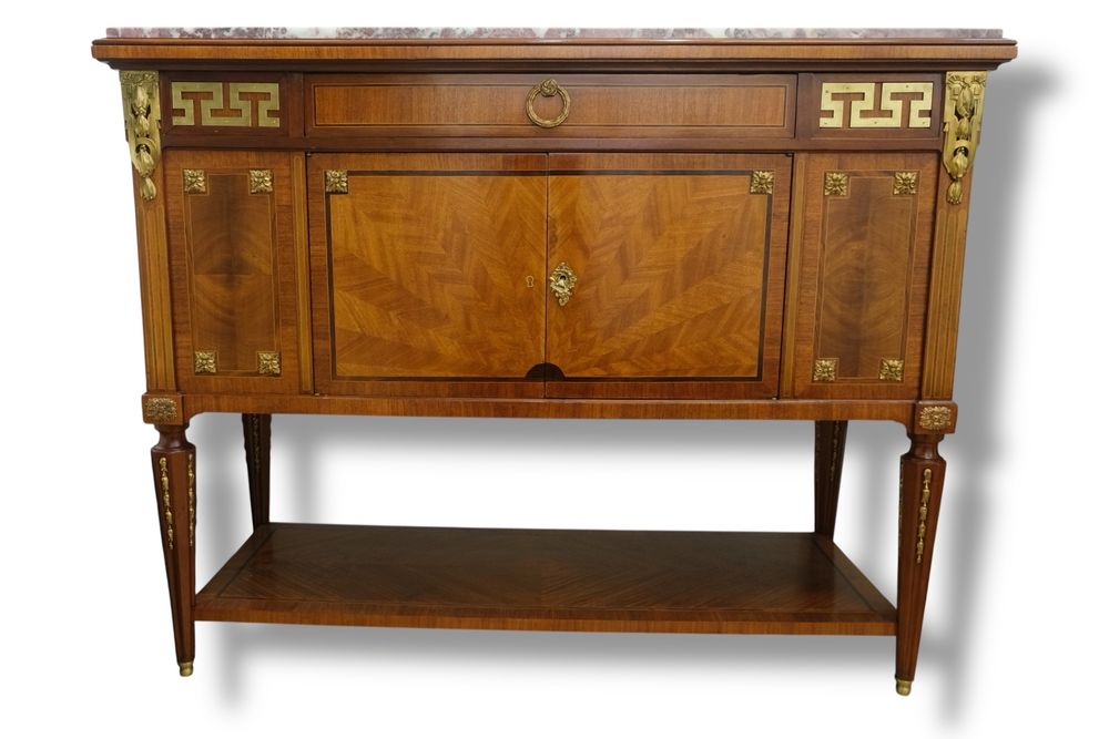 Comoda Louis XVI, din lemn cu inserții și aplicații de bronz doré,