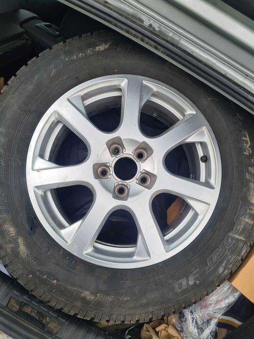 Vand jante + caucicuuri 245/65/17 M+S .