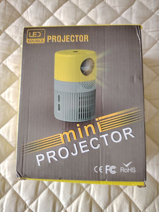 Мини лед проектор + Смарт гривна (подарък)
