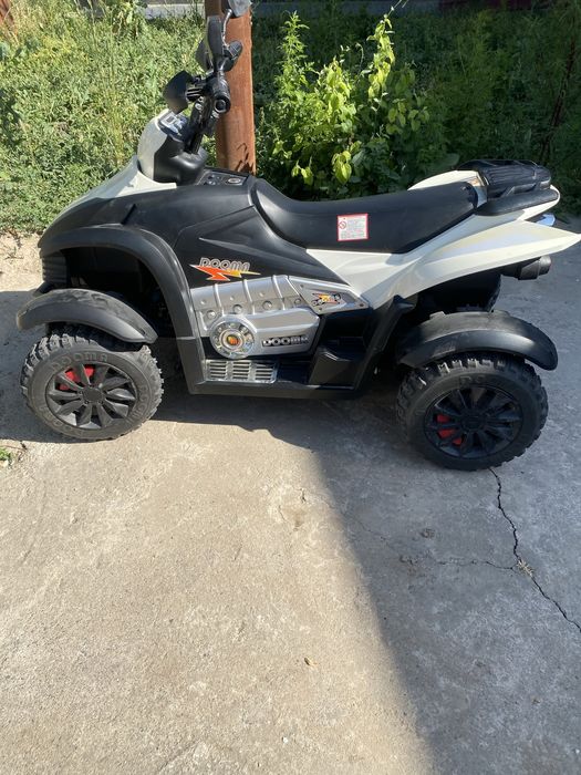 Детская машина DOOMA