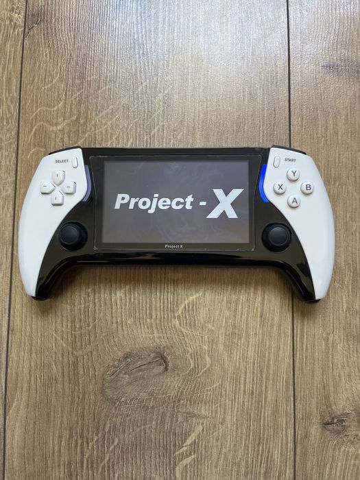 Срочно продам игровую приставку project x